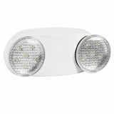 A white emergency exit light fixture with two round clear LED lenses on a plain white background.