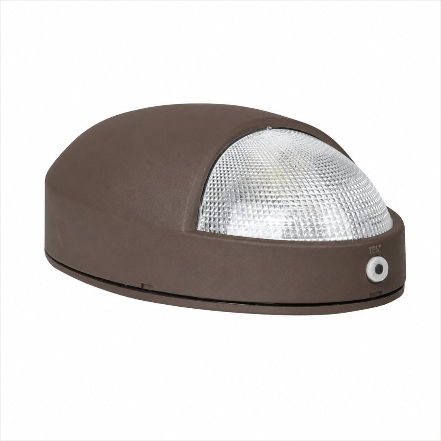 Bottom view of the 12W LED Emergency Wall Pack featuring the self-test button, LED lens, and emergency status indicator for routine maintenance checks.