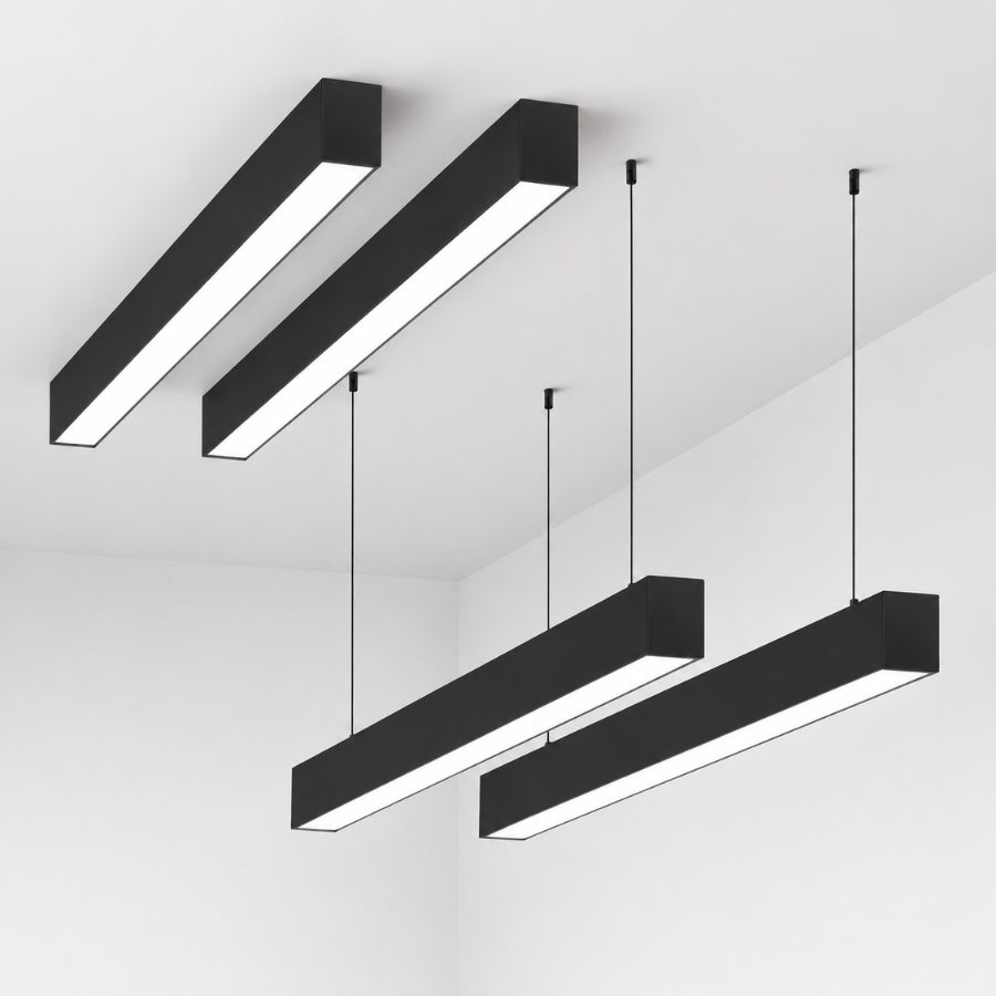 Black 4FT LED linear strip fixture installed on a modern ceiling for commercial office lighting applications