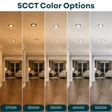 A comparison graphic titled '5CCT Color Options' showing five vertical interior hallway scenes with recessed ceiling lights, each lit in a different warm/cool white tone: 2700K, 3000K, 3500K, 4000K, and 5000K. The panels demonstrate how the same room looks under different color temperatures.