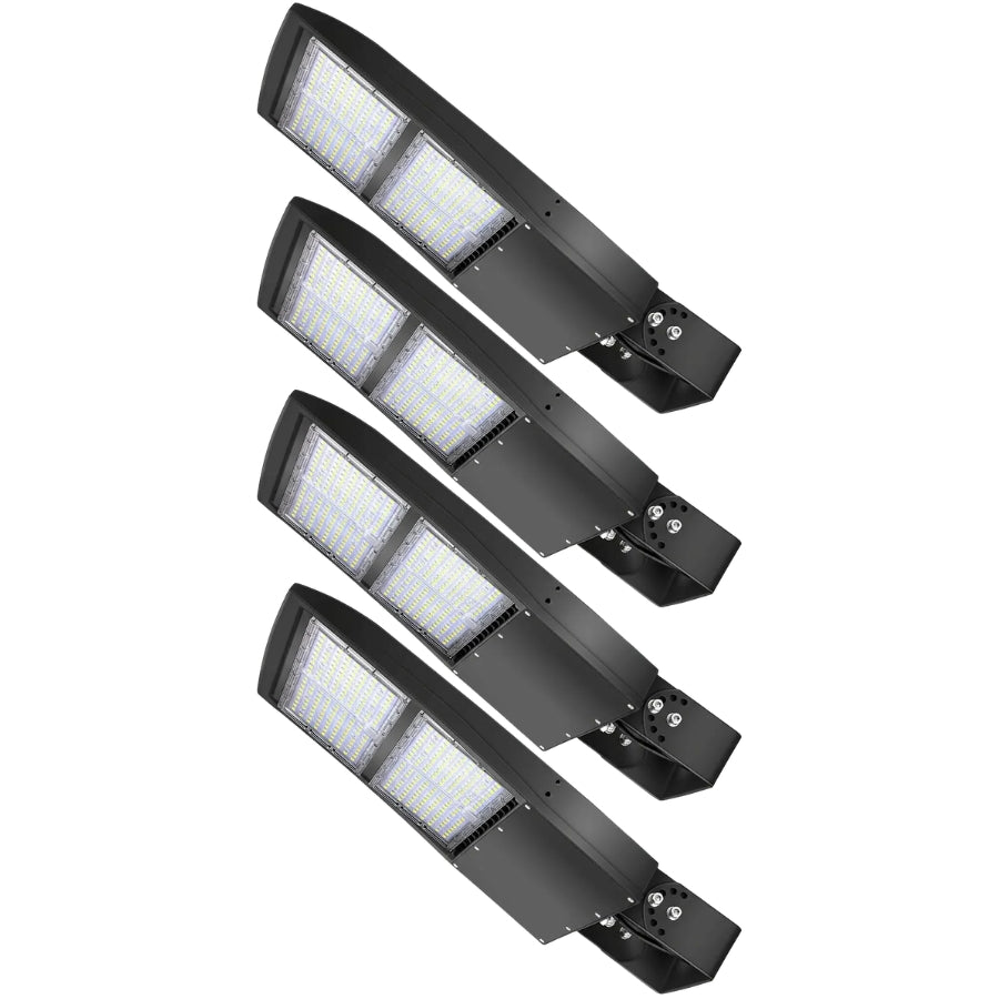 Four-pack of 300W LED parking lot lights with adjustable yoke mounts for outdoor commercial lighting