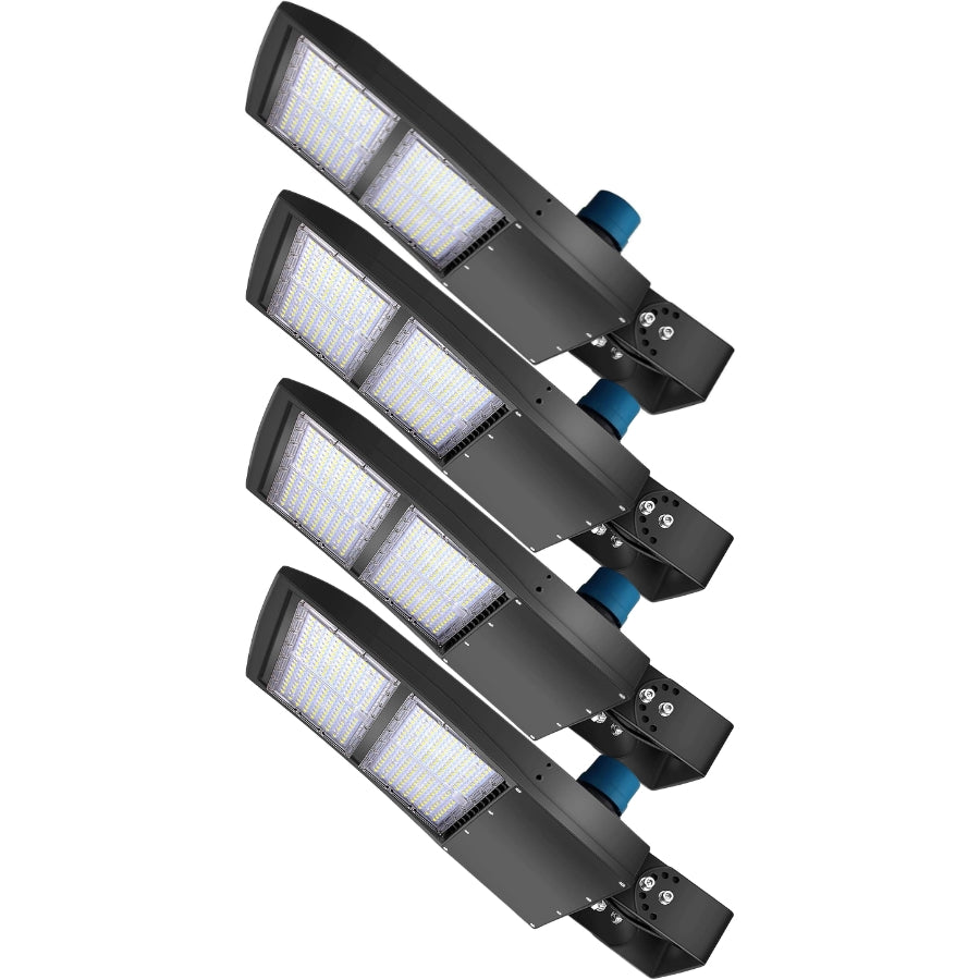 Four-pack of LED parking lot lights with adjustable yoke mounts for outdoor area lighting