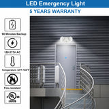 An LED emergency exit light mounted above a gray door in a metal building, with product feature icons and text on the left including 90 minutes backup, 120-277V AC, temperature range, fire-resistant, and UL listed.