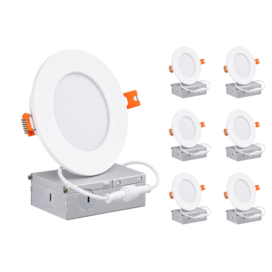 A set of six recessed LED ceiling light downlights shown with their mounting boxes. The main light is large and open, showing the white circular panel, white cord, and orange connector, while the remaining five are shown smaller to the right to indicate a multi-pack.