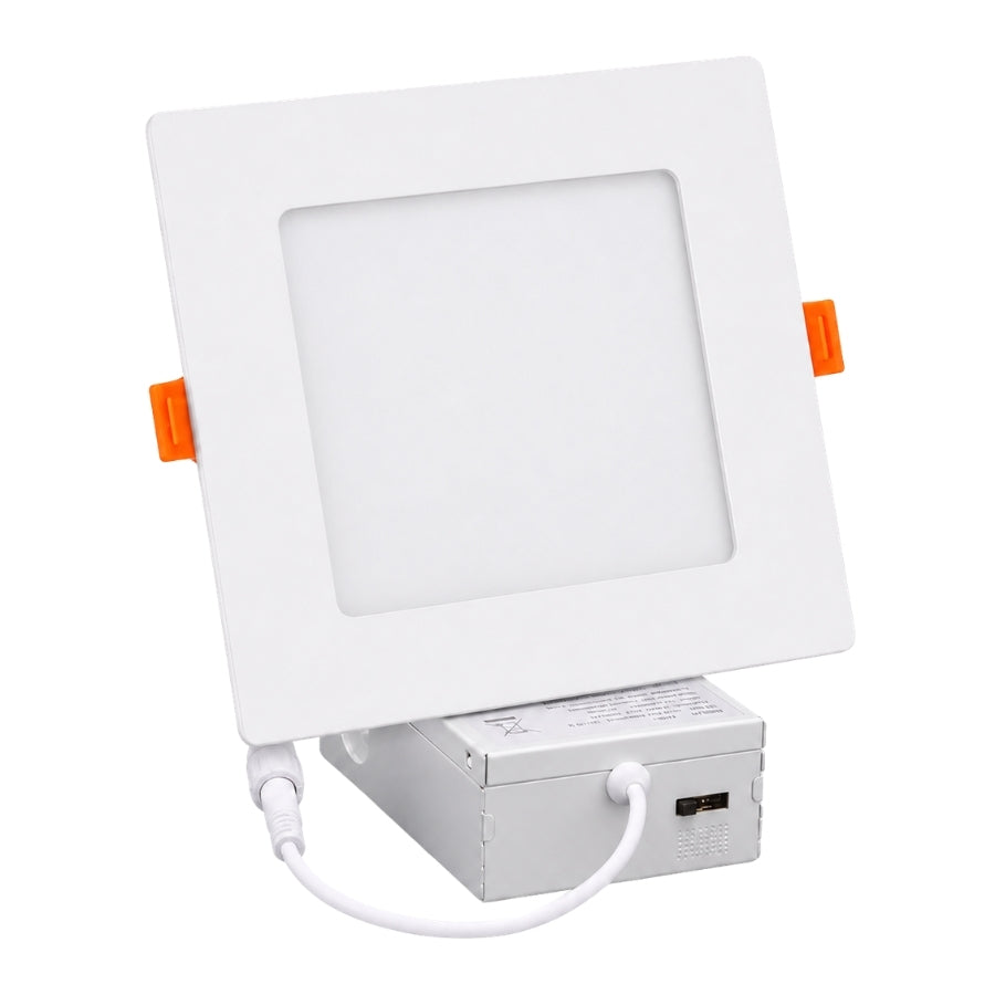 A square recessed LED light fixture with a white frame, orange side adjustment tabs, and an attached white power box with a USB port, shown on a white background.